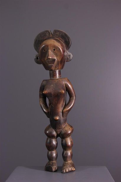 null Female Boa figure, DRC ex Zaire
Statuette featuring a stylized face softened...
