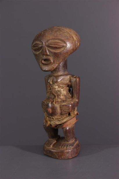 null Songye Nkisi fetish statuette, DRC
Wrapped in fragments of fabric held together...