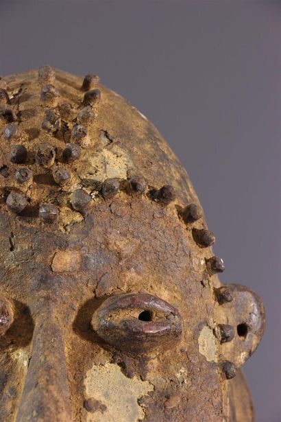 null Mambila mask, Cameroon
Coated with an inlaid crusty patina, this visually powerful...