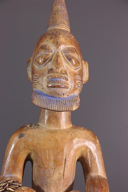 null Yoruba statue, Nigeria
This statue incarnates a deified ancestor. Seated, he...