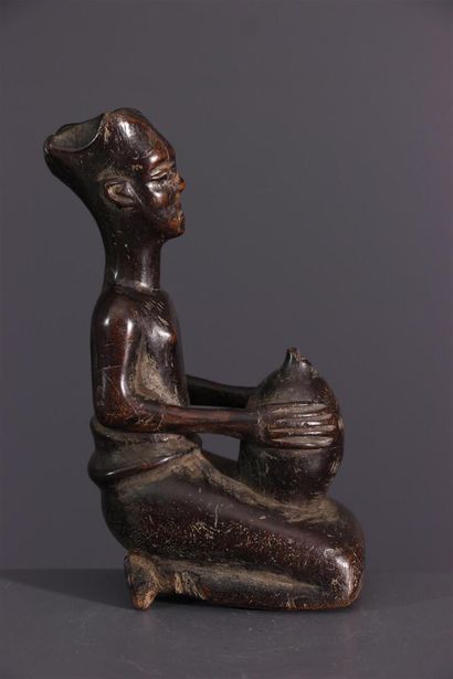null Female Shoowa Bushoong figure, DRC
This Shoowa statuette is a naturalistic figure...