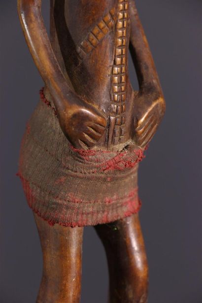 null Tabwa statuette, DRC.
African Tabwa statuette, recognizable by its linear scarification...