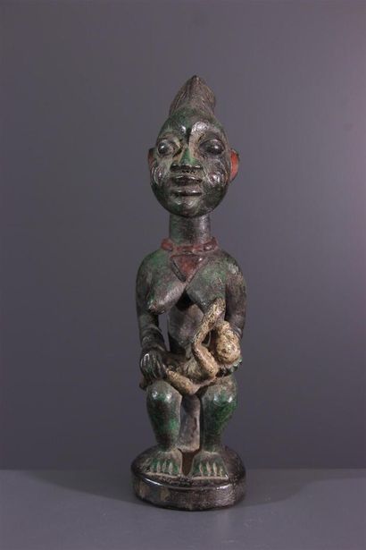 null Yoruba statue Nigeria. 
This African tribal art sculpture is supposed to facilitate...
