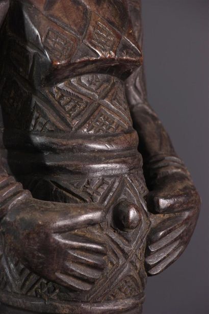 null Figure of a Dengese Isikimanji ancestor, DRC ex-Zaire.
Kneeling with his hands...