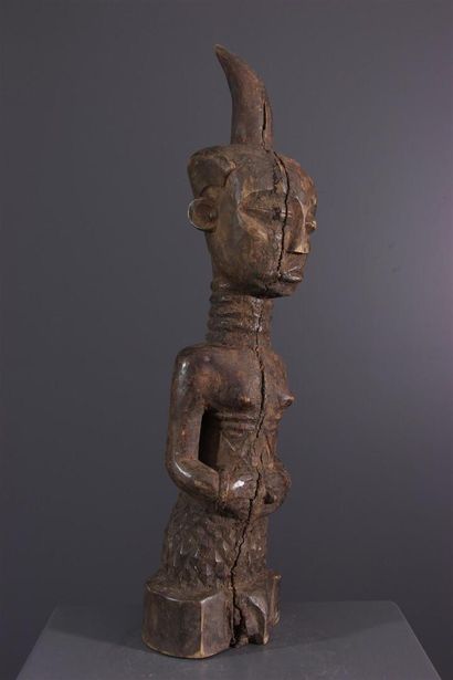 null Ndengese Congo ancestor statue
The flared hairstyle topped by a horn is characteristic...