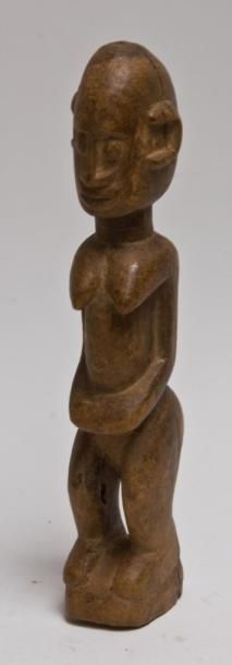 null DOGON, Mali Statue H: 0.00 cm x L: 32.50 cm Statuette féminine bois clair.