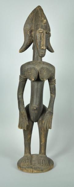 null BAMANA, Mali Statue H: 94.00 cm x L: 0.00 cm Bras cassé, recollé. Statue féminine...