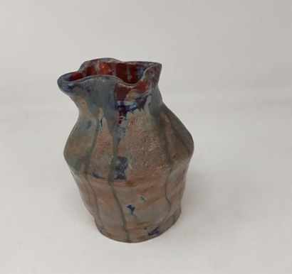 null Vase en grès à décor de coulures

H.: 15 cm (eclats au talon)
