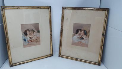 null Pair of raised prints depicting two sleeping children.