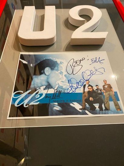 U2 1 signed photo - U2 

Glass frame and mounting