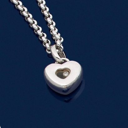 null CHOPARD 

Happy Diamond" heart pendant and its white gold chain (750‰) adorned...