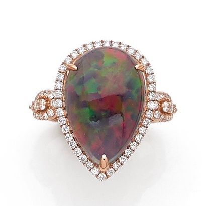 null Important pink gold "drop" ring (750‰) adorned with a pear-cut cabochon black...