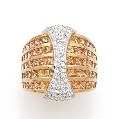 null RING domed in yellow and white gold (750‰) centered on a pavé of brilliant-cut...