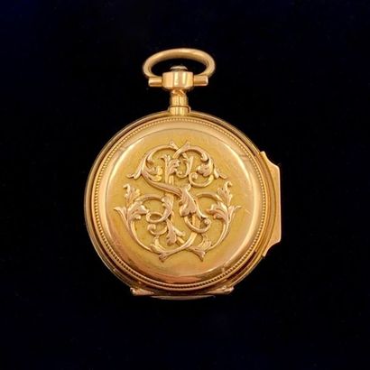 null YELLOW GOLD COLLAR WATCH (750‰) decorated with an applied and chiselled monogram....