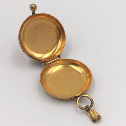 null CURRENCY HANGER PENDANT circular in granulated gold metal.