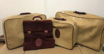 null CARTIER. Lot de trois valises dont deux en cuir bordeaux et une en daim bordeau,...