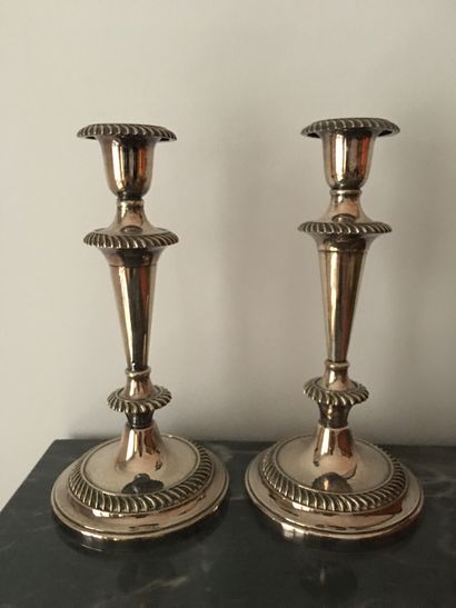 null Pair of silver metal candle holders. H.: 25 cm