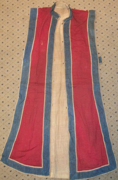 null Xia Pei or tunic, China, 18th-19th century, red cloth edged with blue braid