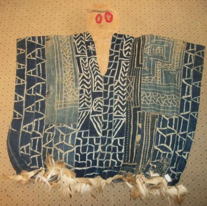 null Hooded bamiléké tunic, Cameroon, made up of more than three blue and cream ndop,...