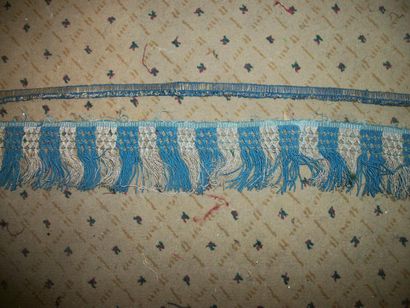 null Blue and cream fringe fringe, 16th century. We join a blue and gold braid of...