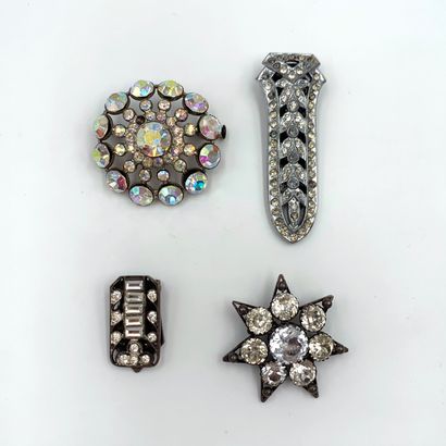 null Silver "star" pin (min 800‰) set with white stones. Metal pin. 

Gross weight:...