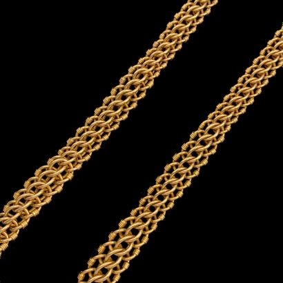null A yellow gold (750‰) drop necklace, with interlaced and partially gadrooned...
