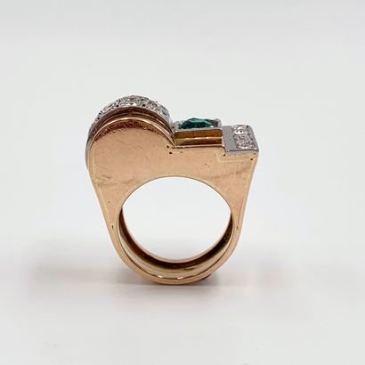 null A geometric platinum (950‰) and rose gold (750‰) partially domed "tank" ring,...
