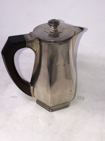null Silver coffee pot (950/°°) with cut sides, the handle in rosewood. 

Minerva...
