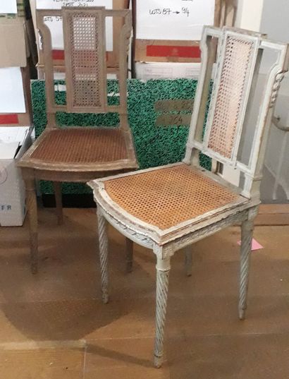 null Pair of grey lacquered wood caned chairs, resting on tapered legs with twisted...