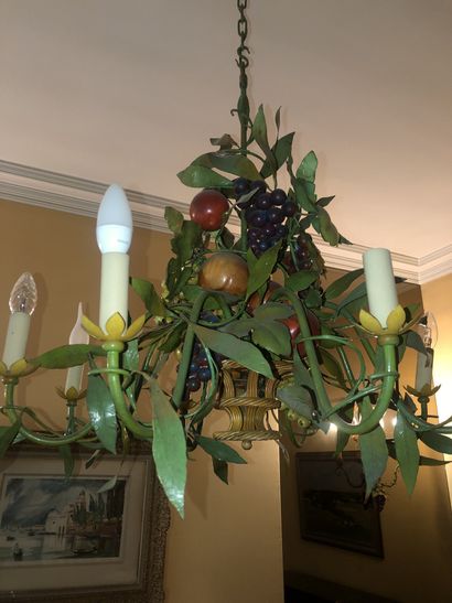 null Pair of sconces and chandelier in polychrome iron with fruit decoration

Modern...
