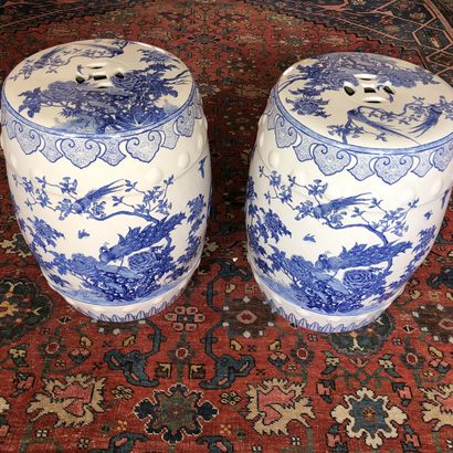 null A pair of blue-white porcelain garden stools with peacock design, 

China, second...