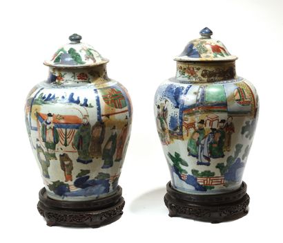 null A pair of porcelain covered vases decorated with green family enamels "Animated...