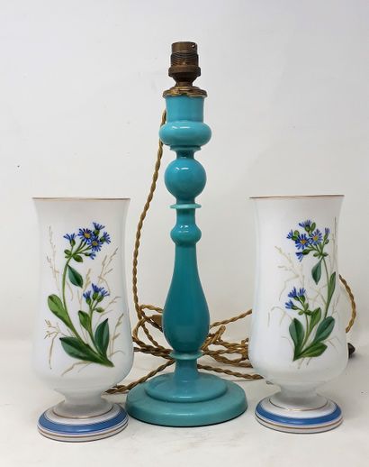 null Two white opaline glass vases with polychrome decoration of flowers.

A turquoise...