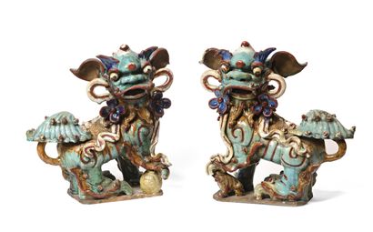 null 
Two polychrome glazed ceramic dogs of Pho




Vietnam, late 19th century




H.:...