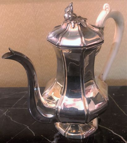 null Silver teapot 950‰, pinched rib model and ivory handle

Gross weight: 596 g