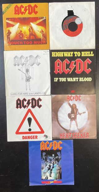 HARD ROCK Sept disques 45 T (dont Jukebox) - AC DC

VG+ à EX; VG+ à EX