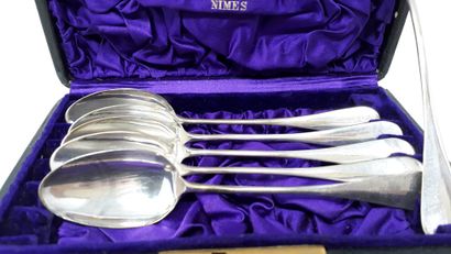 null In a case lined with black leather:

Six small silver spoons (950 thousandths),...