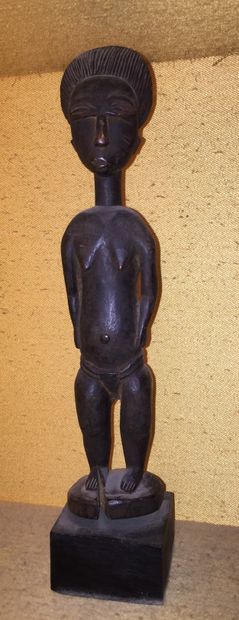 null Ecole africaine moderne, dans le gout Baoule

"Femme debout"

Sculpture en bois

H.:...