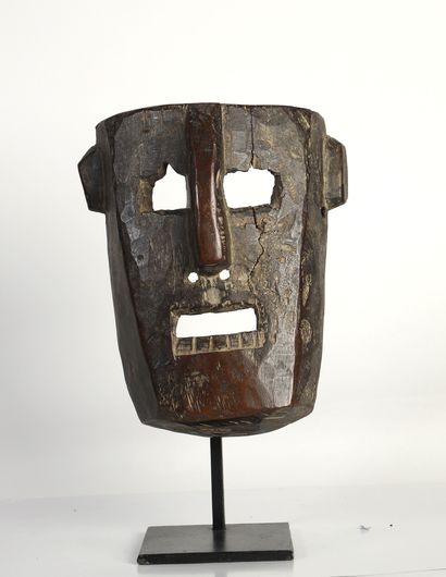 null Dance mask with a nose in relief. Hard wood, old honey and brown patina, trace...