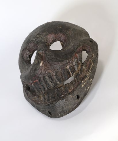 null Citipati" mask with a smiling skull. Wood with a brown patina slightly thicker...
