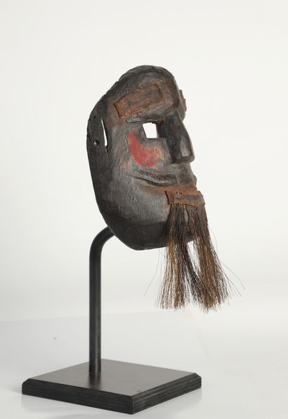 null Popular dance mask. Wood, horse hair, leather and red pigment

Southern Mexico,...