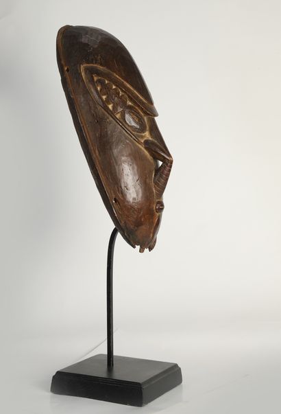 null Brag" type mask, wood with honey and brown patina, marks of use

Middle Sepik...