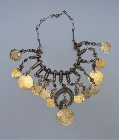 Necklace drapery gilded metal decorated with pendants in the form of coins. We joined...