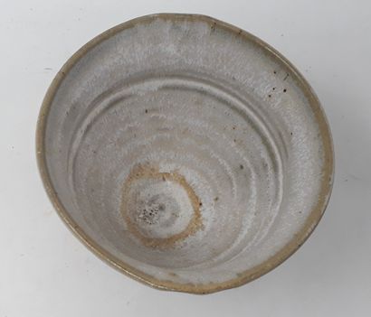  VOELKEL Patrice 
Stoneware bowl partially covered in iridescent white, monogrammed...