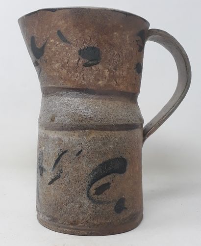 null School Xth century

Straight stoneware pitcher with black decoration, monogrammed...