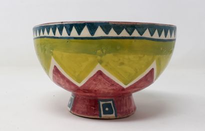  TREE WITH GOATS 
Earthenware bowl decorated with green and red zigzags, signed and...