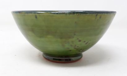  PEIGNON Jean-Noël 
Earthenware cup with green background and brown decoration, signed...