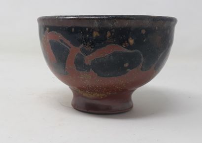 POTIER V. 
Stoneware bowl with red and black...