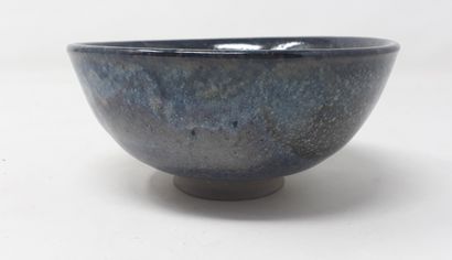 null ROLLET Patrick

Stoneware bowl with blue and brown glaze, signed and n°151 under...