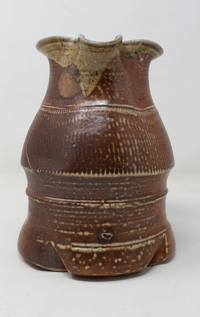  GALISSAIRES François 
Brown stoneware pitcher with pinched spout and incised decoration,...